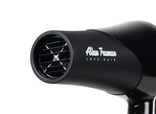 How does the Tourmaline Ceramic Grill in a hairdryer help?