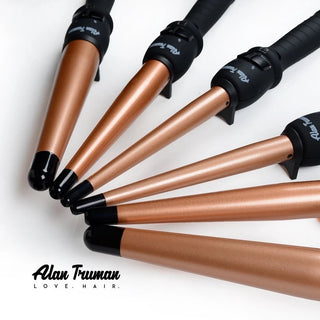 How is a curling wand different from a curling tong?